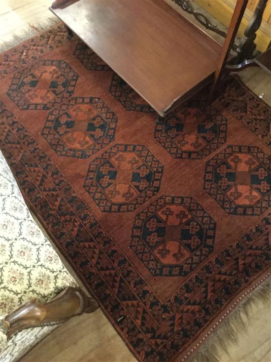 Persian red ground rug(-)